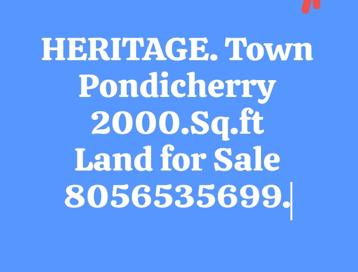 Advertisement for heritage land for sale in Pondicherry, measuring 2000 sq. ft, with a contact number.